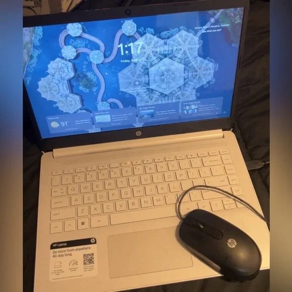 HP Silver Laptop with Black and Red Accessories